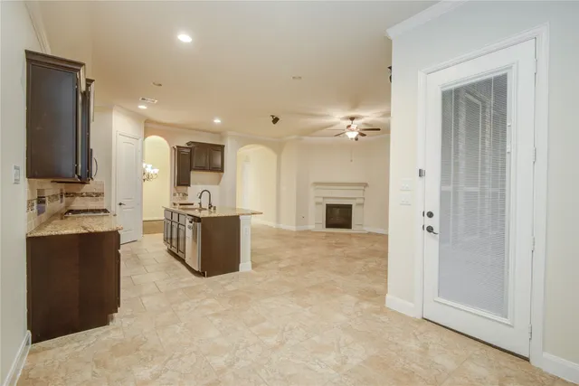 a large bathroom with a tub sink and mirror