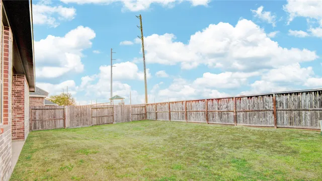 a view of a backyard with a garden