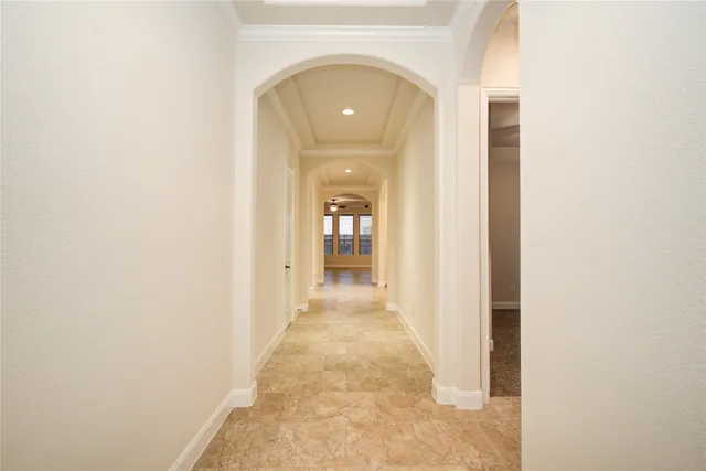 a view of a hallway with a white walls