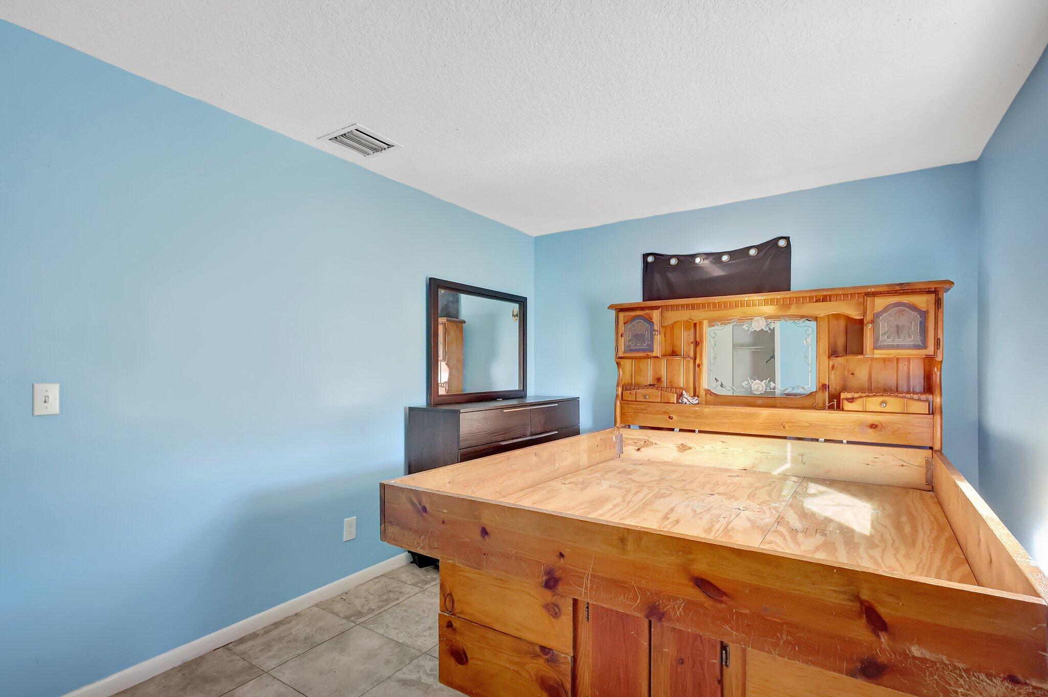 7406 Donlon Road Fort Pierce, FL 34951 - Photo 15 of 40 Master Bedroom