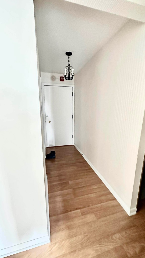 2500 Windsor Mall, Unit 2D Park Ridge, IL 60068 - Photo 4 of 13 a view of a room with wooden floor