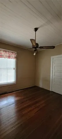 a view of room with hardwood floor