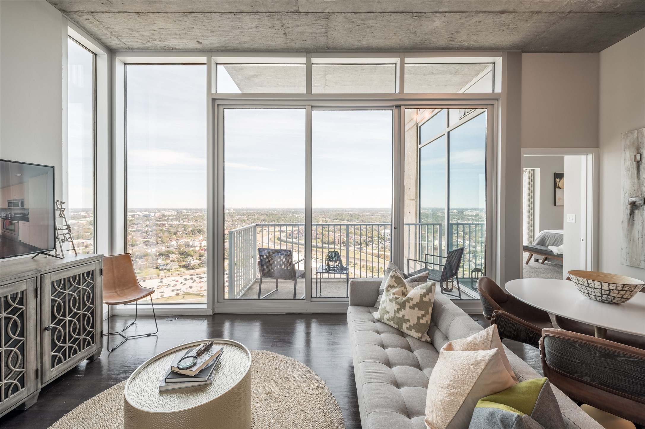 5927 Almeda Road, Unit 20814 Houston, TX 77004 - Photo 1 of 9 Step into this beautifully designed two-bedroom apartment with a powder room, where the living space welcomes you with an open, airy layout that feels both expansive and inviting.