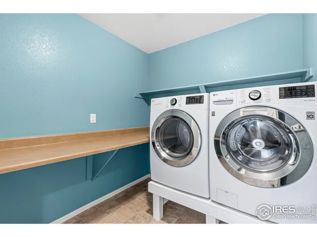 a view of a room with washer and dryer