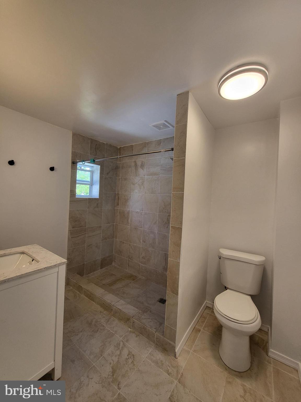 221 East Cameron Street Shamokin, PA 17872 - Photo 15 of 25 Modern bathroom with elegant tile design.