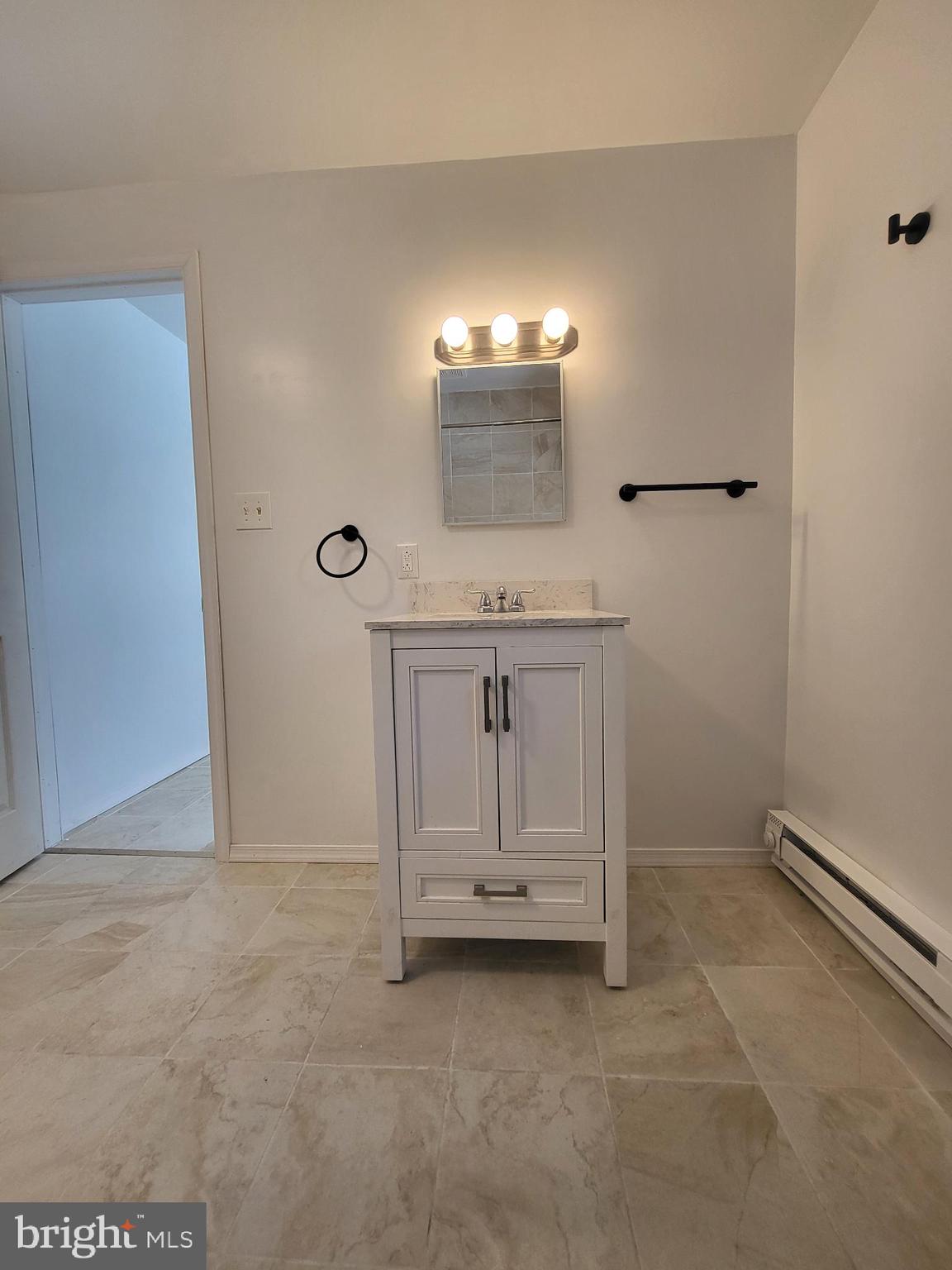 221 East Cameron Street Shamokin, PA 17872 - Photo 16 of 25 Bright and airy bathroom with modern elegance.