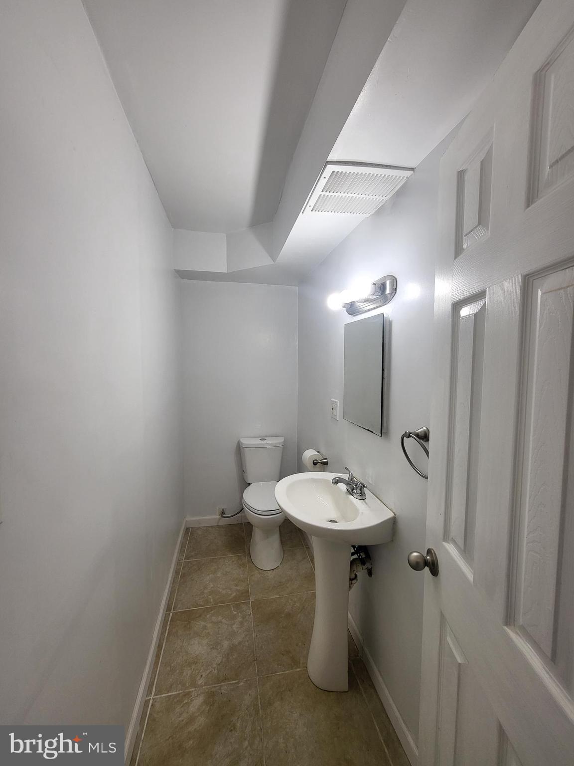 221 East Cameron Street Shamokin, PA 17872 - Photo 18 of 25 Sleek and modern bathroom with clean lines.