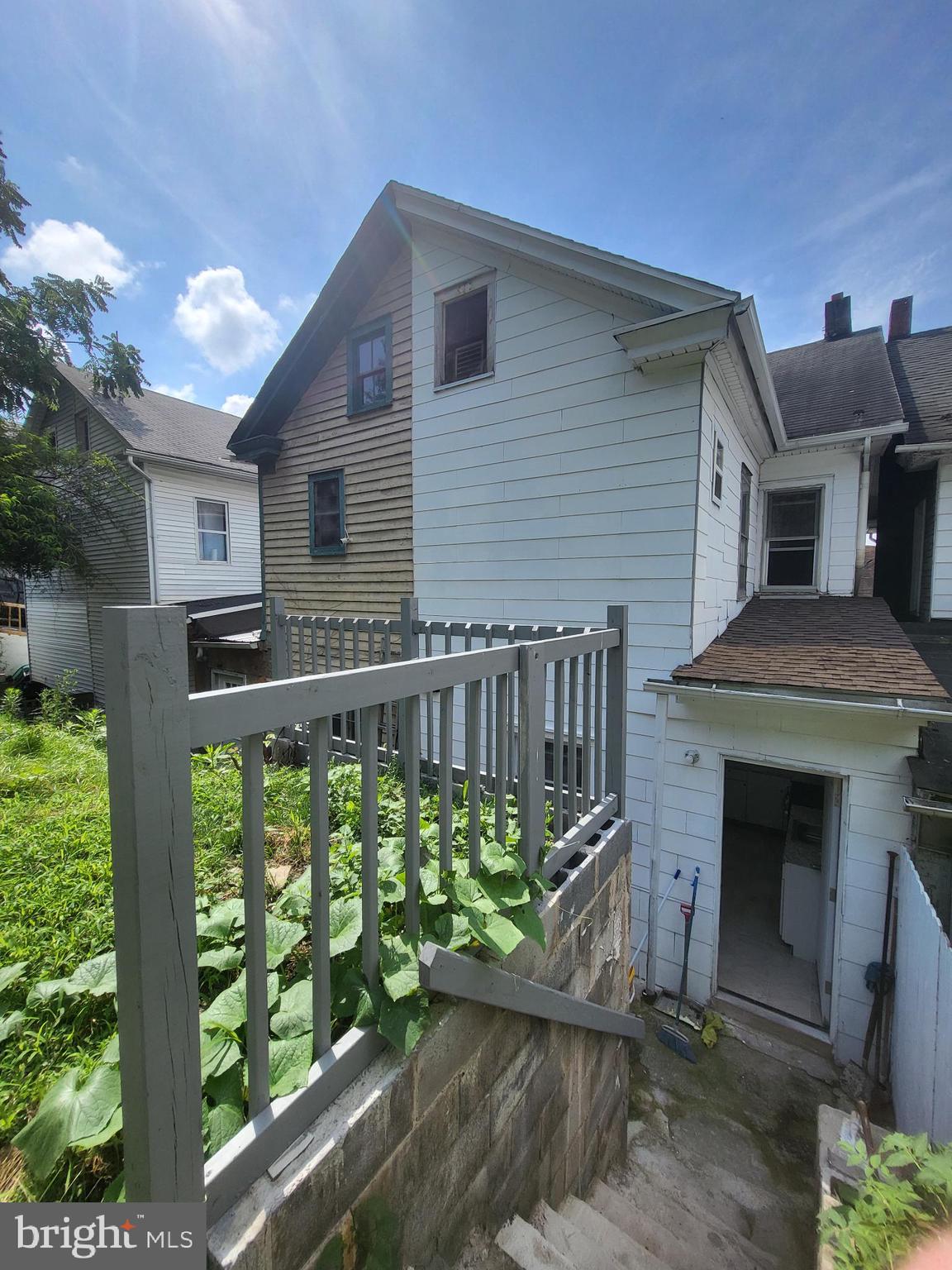 221 East Cameron Street Shamokin, PA 17872 - Photo 25 of 25 Charming home with lush greenery backdrop.