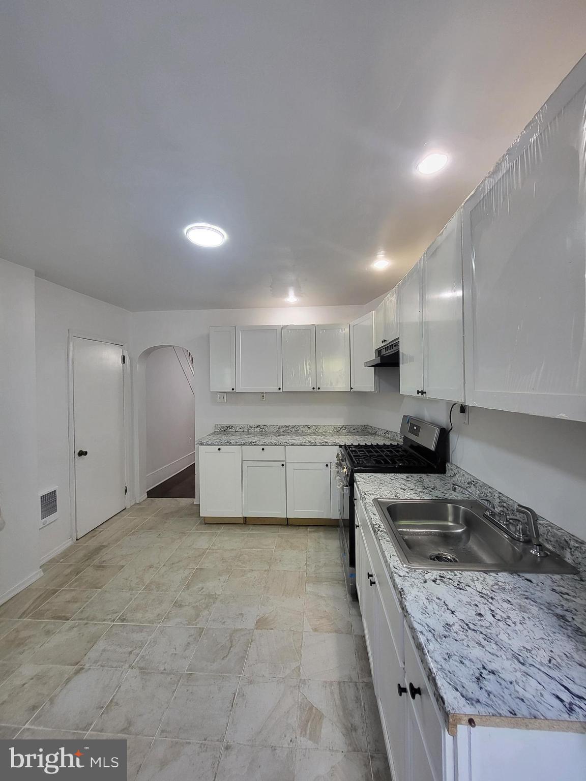 221 East Cameron Street Shamokin, PA 17872 - Photo 6 of 25 Bright and modern kitchen with sleek finishes.