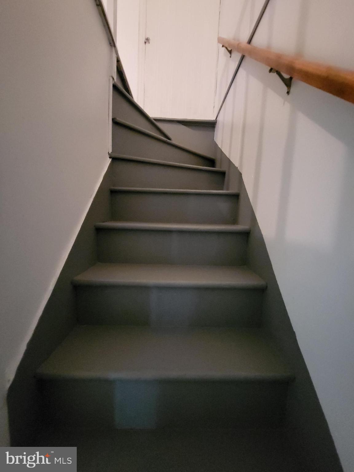 221 East Cameron Street Shamokin, PA 17872 - Photo 9 of 25 Curved staircase leading to new possibilities.