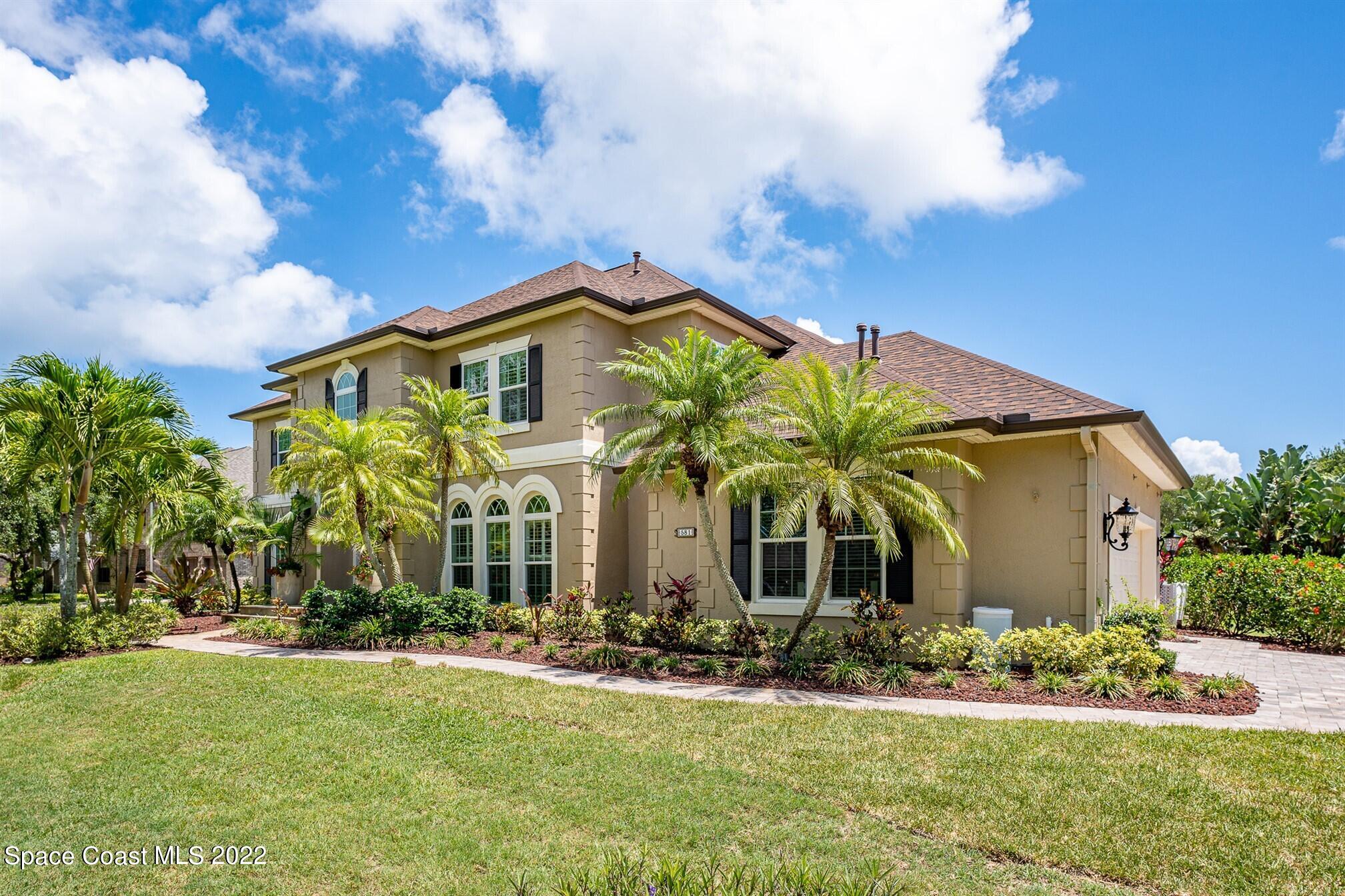 581 Nightingale Drive Indialantic, FL 32903 - Photo 3 of 67 a front view of house with yard