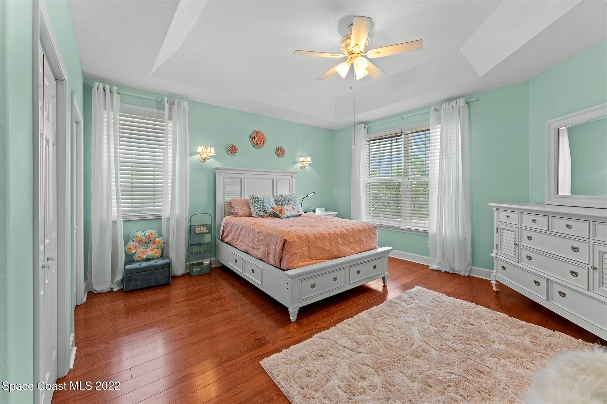 581 Nightingale Drive Indialantic, FL 32903 - Photo 39 of 67 a bedroom with a bed and a window