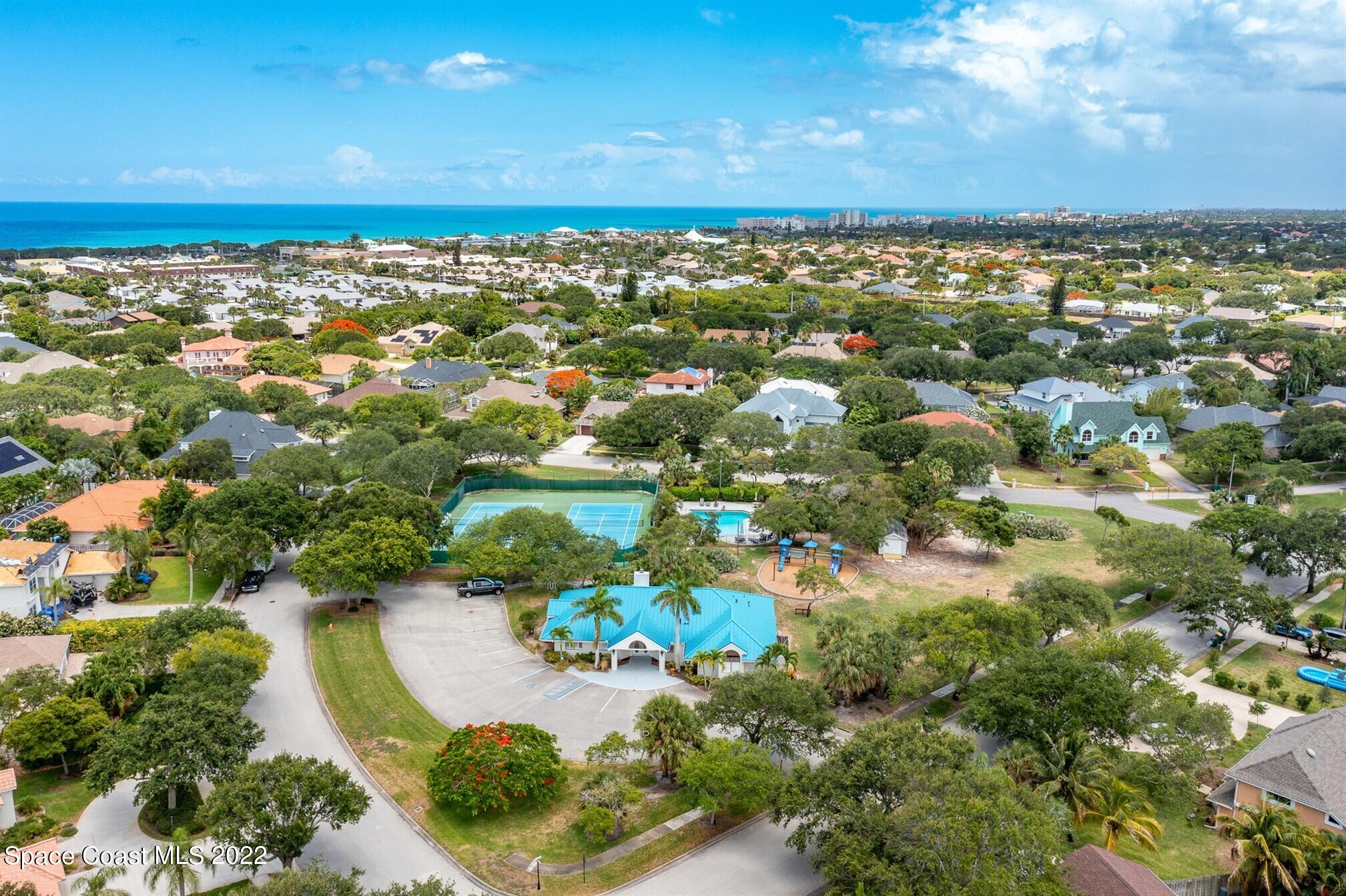 581 Nightingale Drive Indialantic, FL 32903 - Photo 53 of 67 an aerial view of a residential houses with a lake view