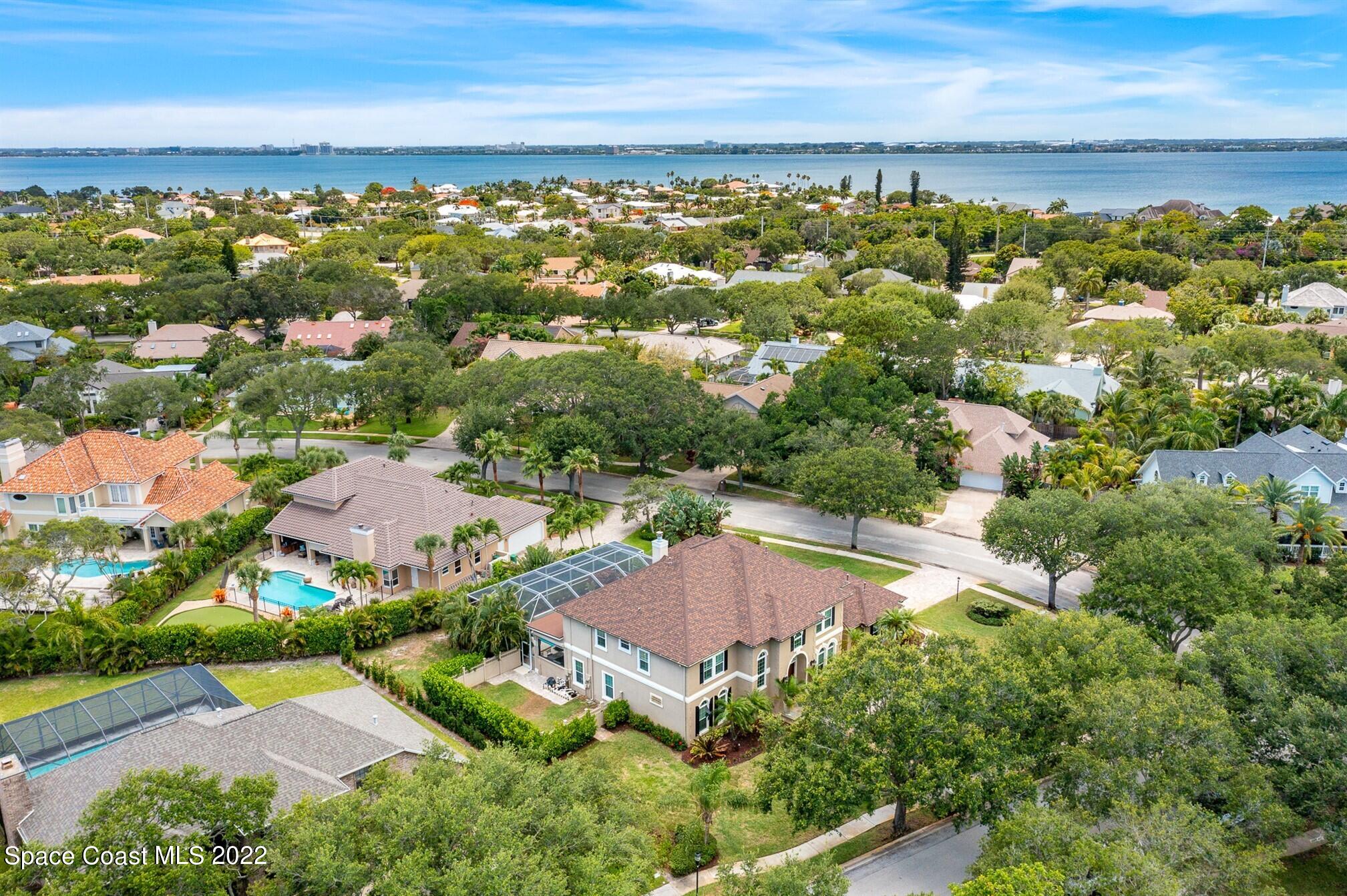 581 Nightingale Drive Indialantic, FL 32903 - Photo 59 of 67 an aerial view of residential houses with outdoor space