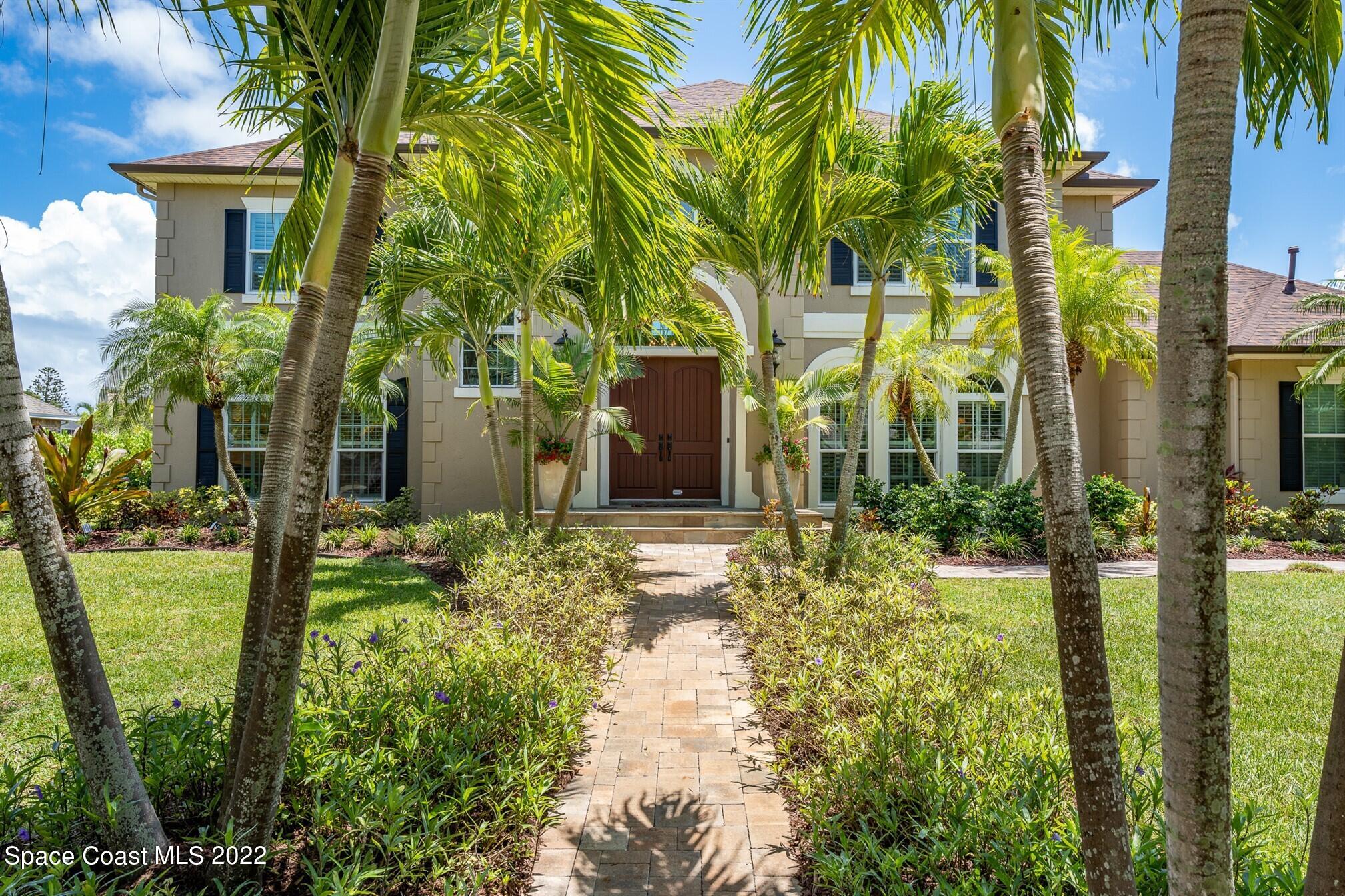 581 Nightingale Drive Indialantic, FL 32903 - Photo 6 of 67 a view of a yard in front of house