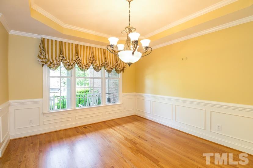 7212 Small Ridge Circle Raleigh, NC 27614 - Photo 13 of 24 a view of a room with window and wooden floor