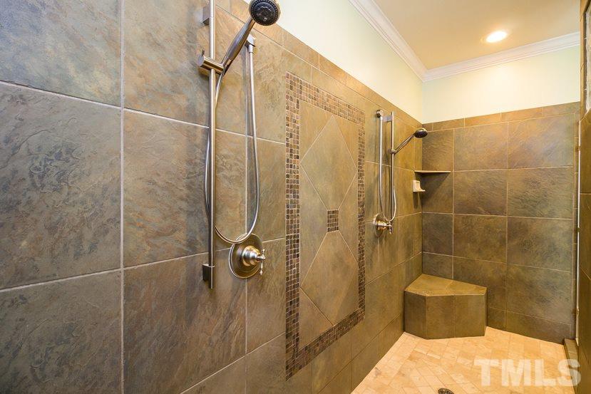 7212 Small Ridge Circle Raleigh, NC 27614 - Photo 16 of 24 a bathroom with a shower