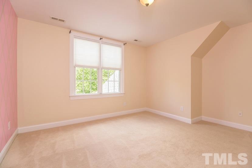 7212 Small Ridge Circle Raleigh, NC 27614 - Photo 17 of 24 an empty room with a window