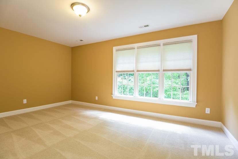 7212 Small Ridge Circle Raleigh, NC 27614 - Photo 20 of 24 an empty room with a window