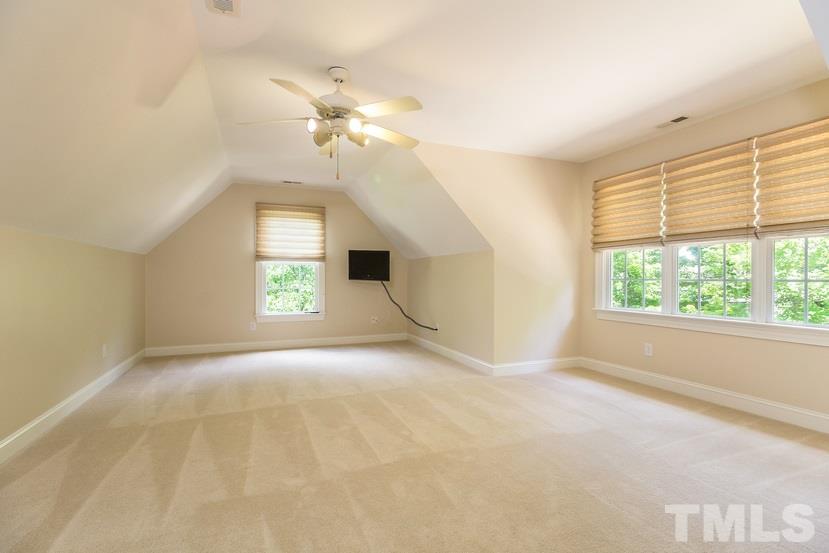 7212 Small Ridge Circle Raleigh, NC 27614 - Photo 22 of 24 a view of an empty room with a window