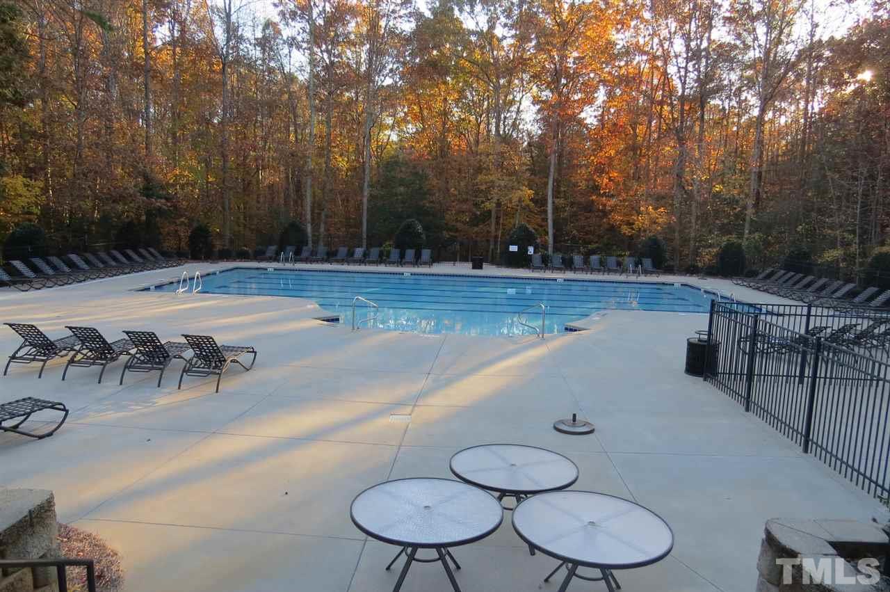 7212 Small Ridge Circle Raleigh, NC 27614 - Photo 23 of 24 a view of a swimming pool with a patio