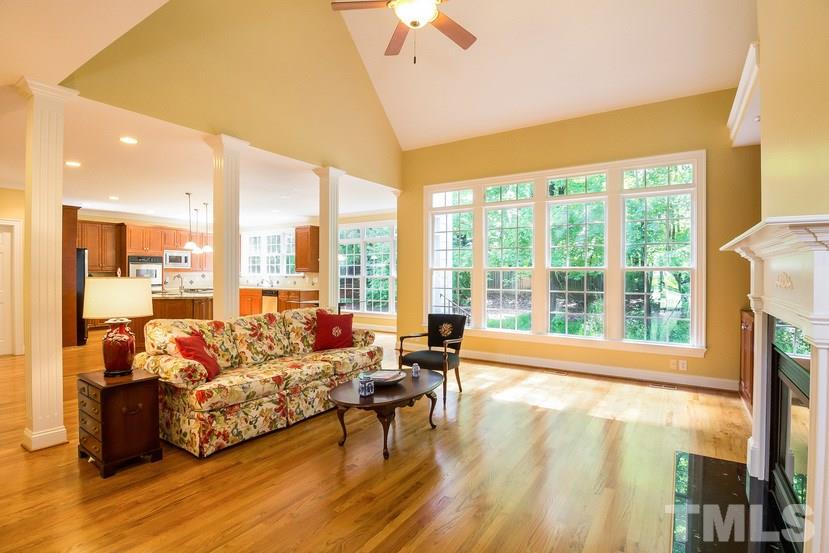 7212 Small Ridge Circle Raleigh, NC 27614 - Photo 9 of 24 a living room with furniture and a large window