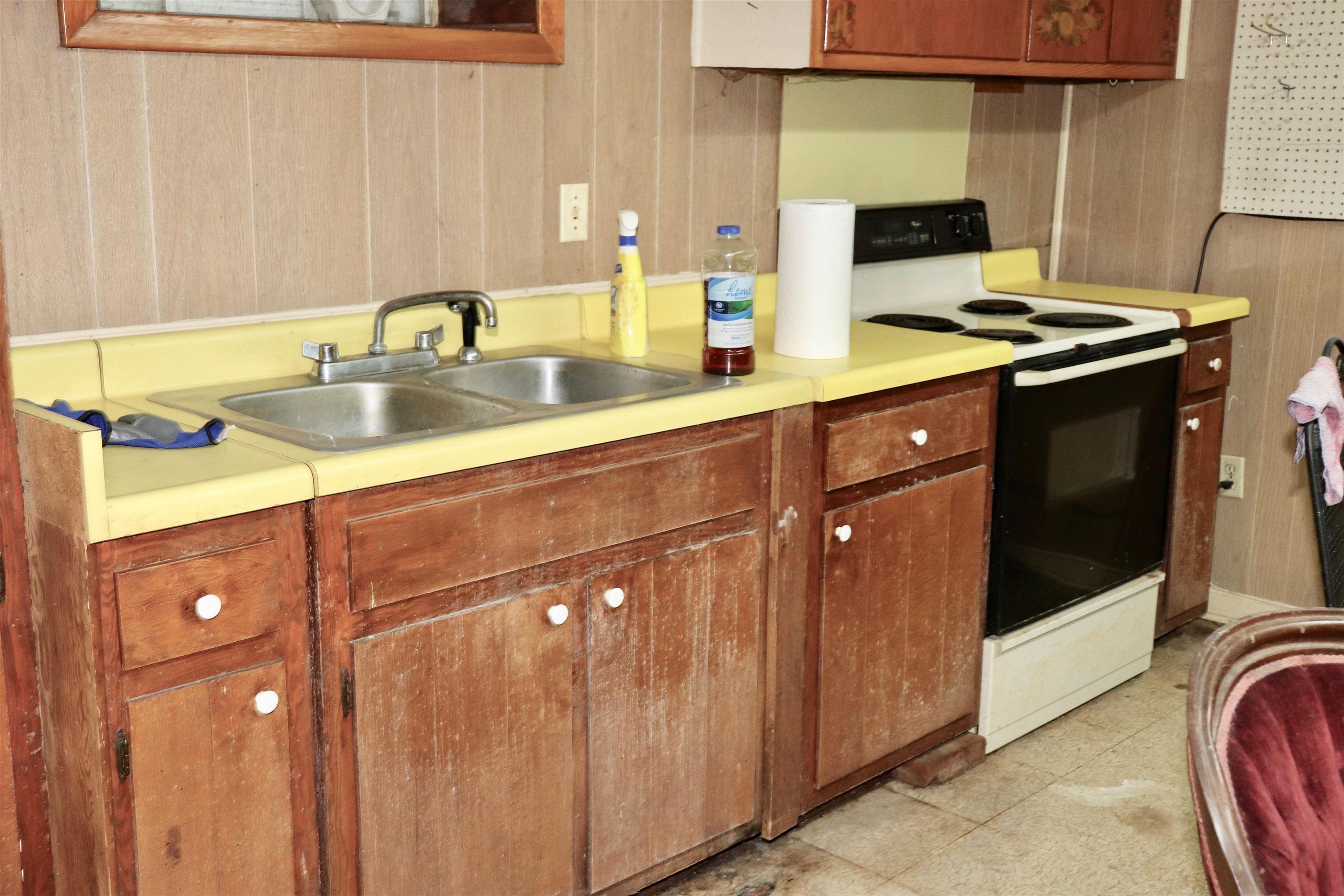 5952 Ivanhoe Road Bartlett, TN 38134 - Photo 14 of 23 a kitchen with a sink and cabinets