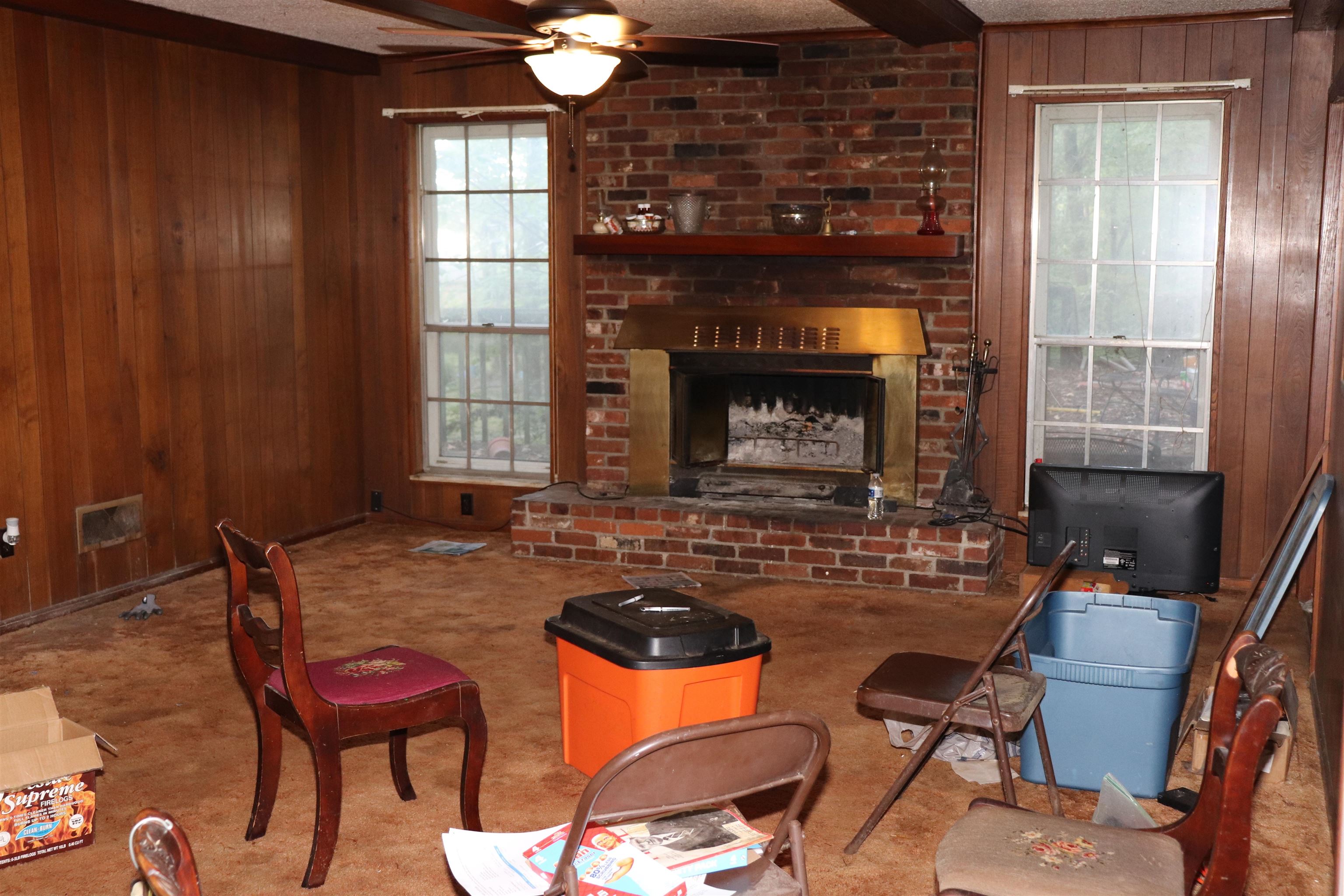 5952 Ivanhoe Road Bartlett, TN 38134 - Photo 2 of 23 a kitchen with a table chairs and a fireplace