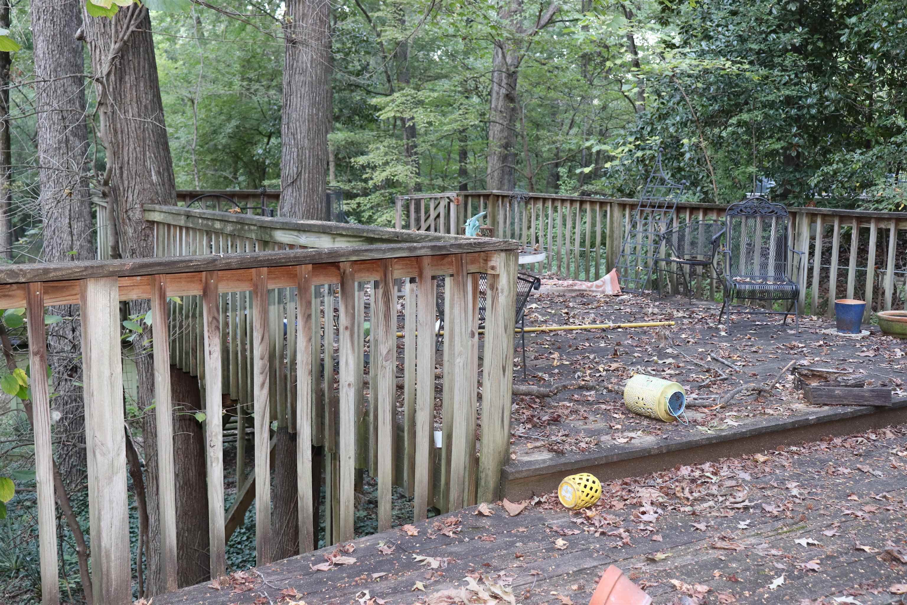 5952 Ivanhoe Road Bartlett, TN 38134 - Photo 22 of 23 a view of a wooden fence with a fire pit