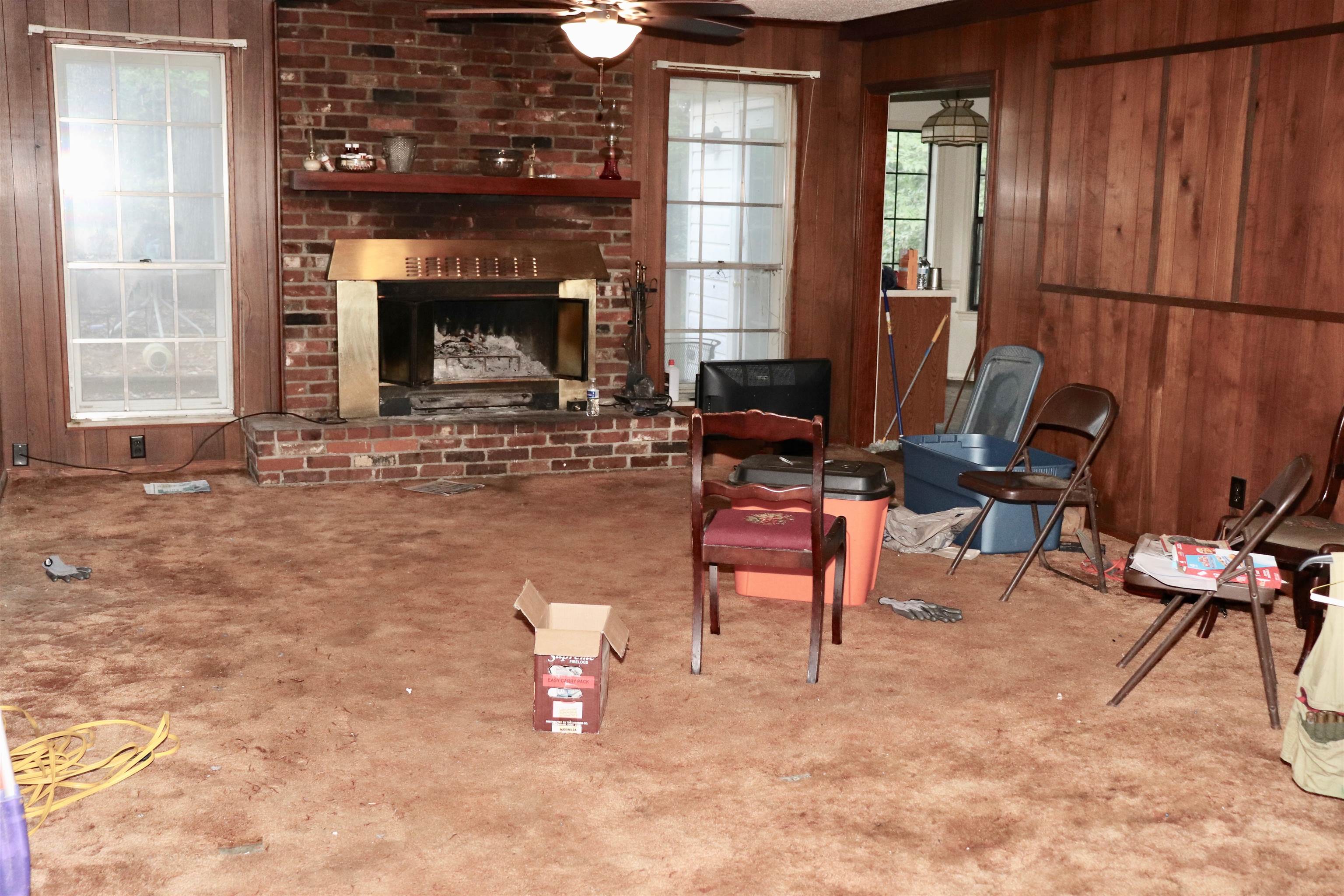5952 Ivanhoe Road Bartlett, TN 38134 - Photo 3 of 23 a living room with furniture a fireplace and a table
