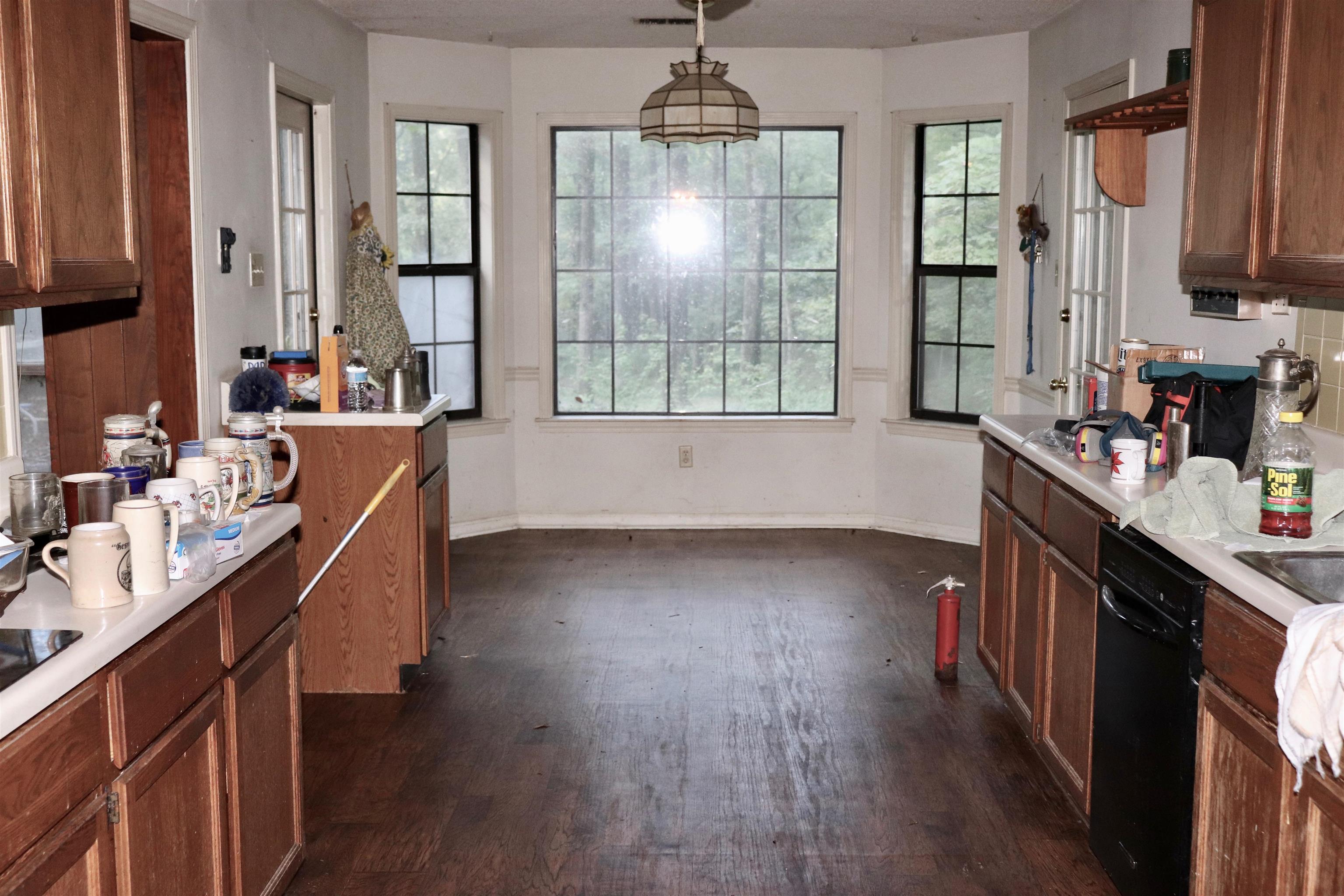 5952 Ivanhoe Road Bartlett, TN 38134 - Photo 5 of 23 a kitchen with kitchen island granite countertop a sink stove and cabinets