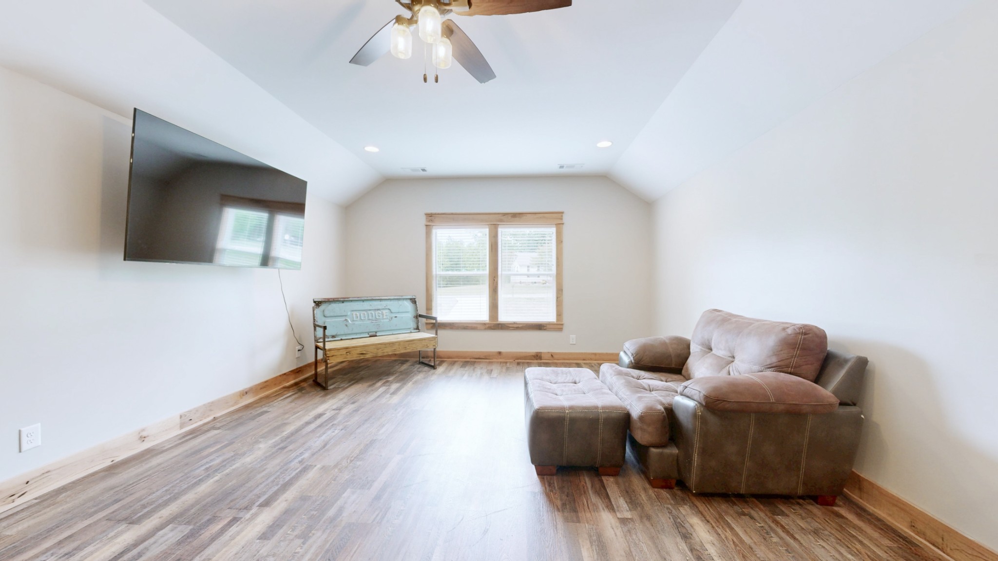 601 King Ridge Road Dowelltown, TN 37059 - Photo 36 of 49 a living room with furniture and a flat screen tv