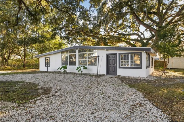 front view of a house with a dry yard