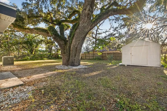 a view of backyard of a house
