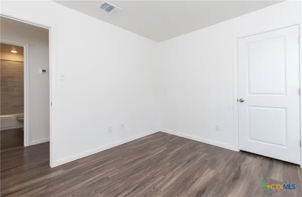 a view of small space with wooden floor