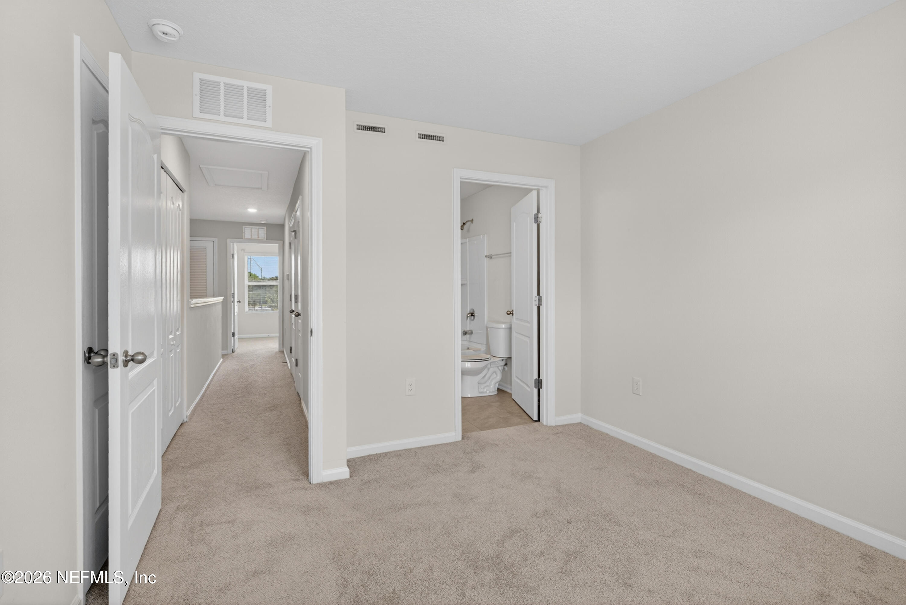 8210 Larose Road Jacksonville, FL 32211 - Photo 20 of 38 an empty room with a bathroom and a sink
