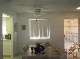 1050 Ramon Road, Unit 127 Palm Springs, CA 92264 - Photo 12 of 25 a living room with furniture