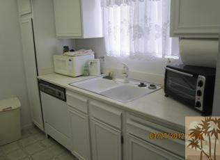 1050 Ramon Road, Unit 127 Palm Springs, CA 92264 - Photo 15 of 25 a utility room with dryer and washer