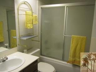 1050 Ramon Road, Unit 127 Palm Springs, CA 92264 - Photo 18 of 25 a bathroom with a sink mirror and toilet