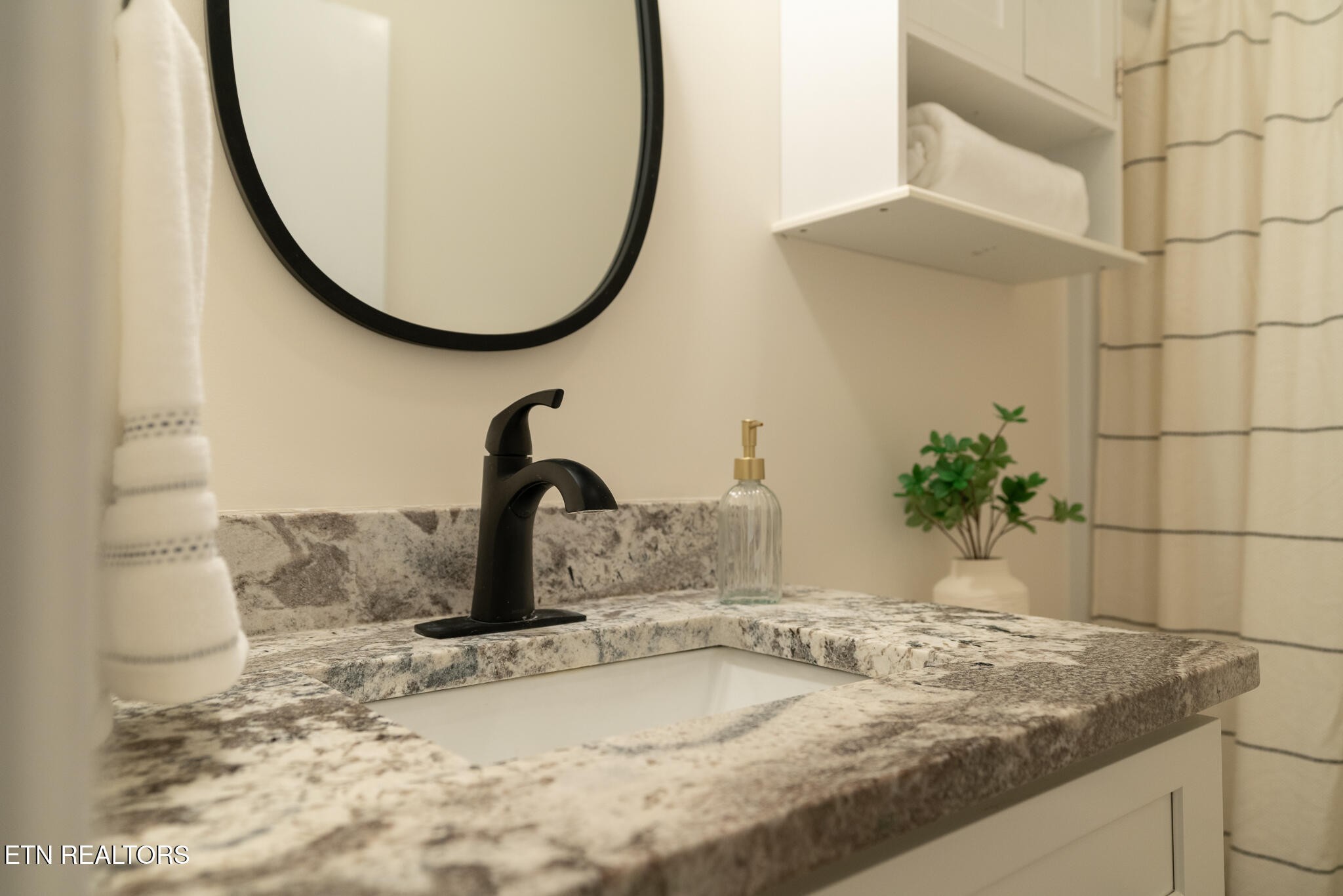 520 Harrow Road Knoxville, TN 37934 - Photo 25 of 42 a bathroom with a granite countertop sink and a mirror