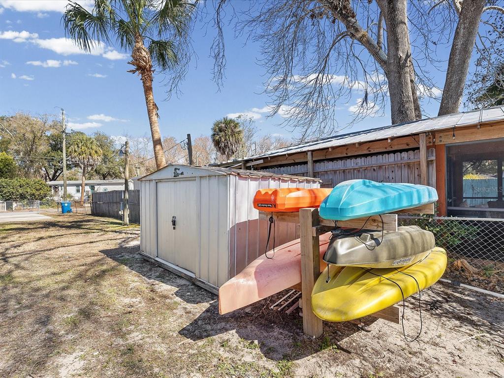 6419 West Richard Drive Weeki Wachee, FL 34607 - Photo 26 of 75 a view of a swimming pool with a patio