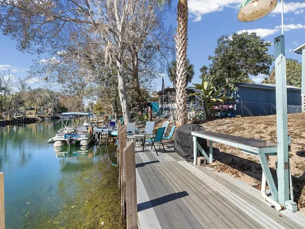 a view of a house with outdoor space and sitting area