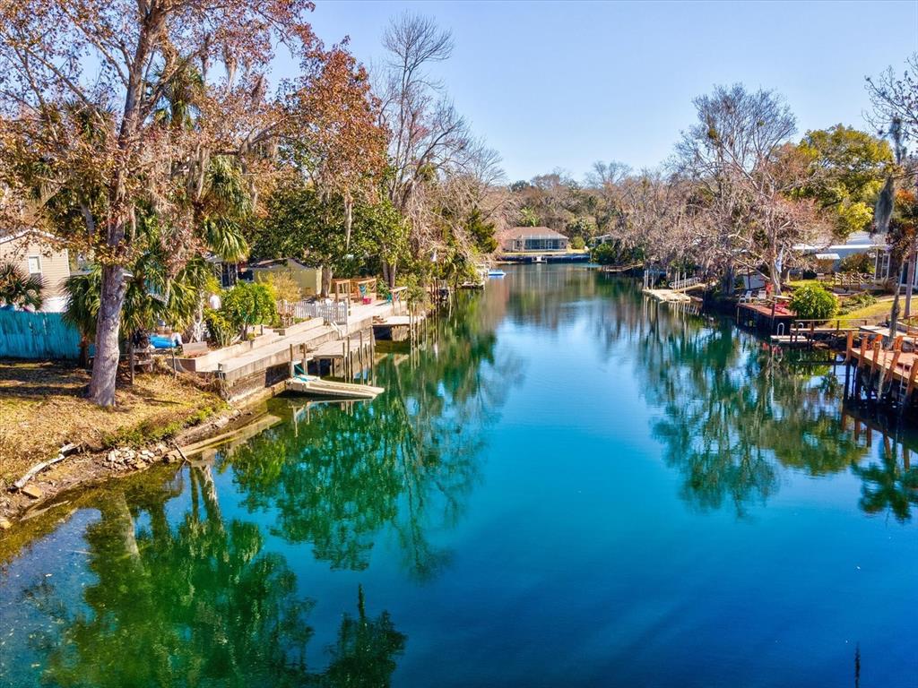 6419 West Richard Drive Weeki Wachee, FL 34607 - Photo 36 of 75 a view of a lake with houses