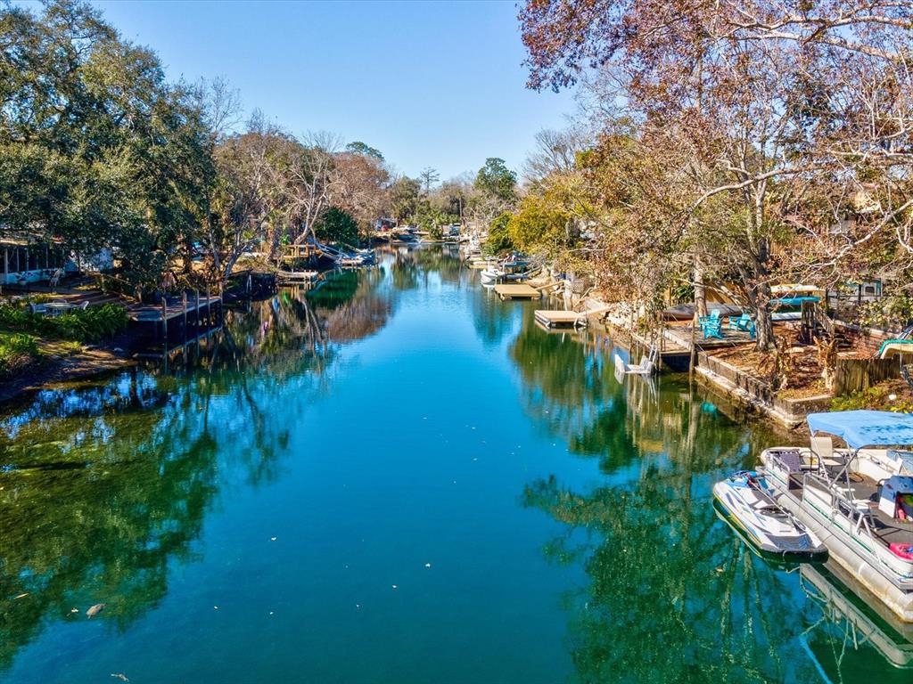 6419 West Richard Drive Weeki Wachee, FL 34607 - Photo 37 of 75 a view of a lake with houses
