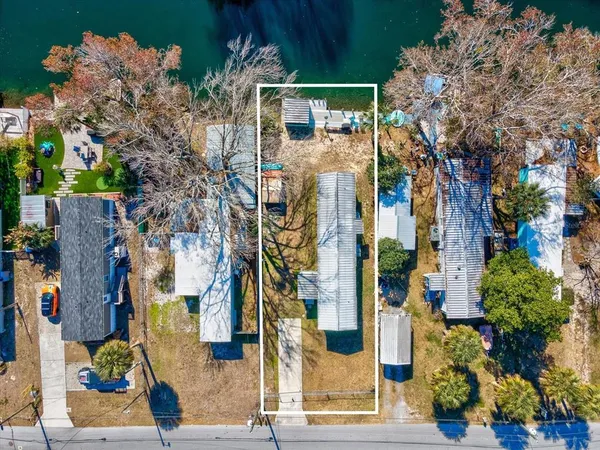 a view of a lake with a building in the background