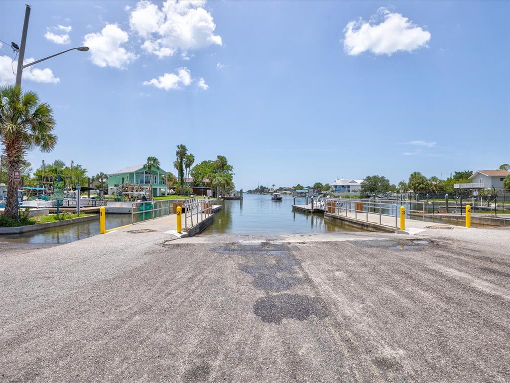 6419 West Richard Drive Weeki Wachee, FL 34607 - Photo 48 of 75 a view of swimming pool with outdoor seating and city view