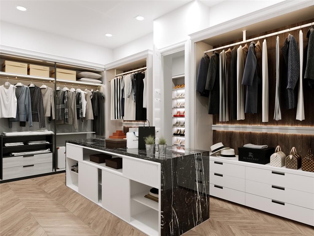 10010 Strait Lane Dallas, TX 75229 - Photo 12 of 30 a kitchen with stainless steel appliances kitchen island granite countertop a refrigerator and a sink