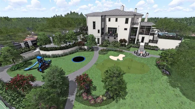 an aerial view of a house with a garden