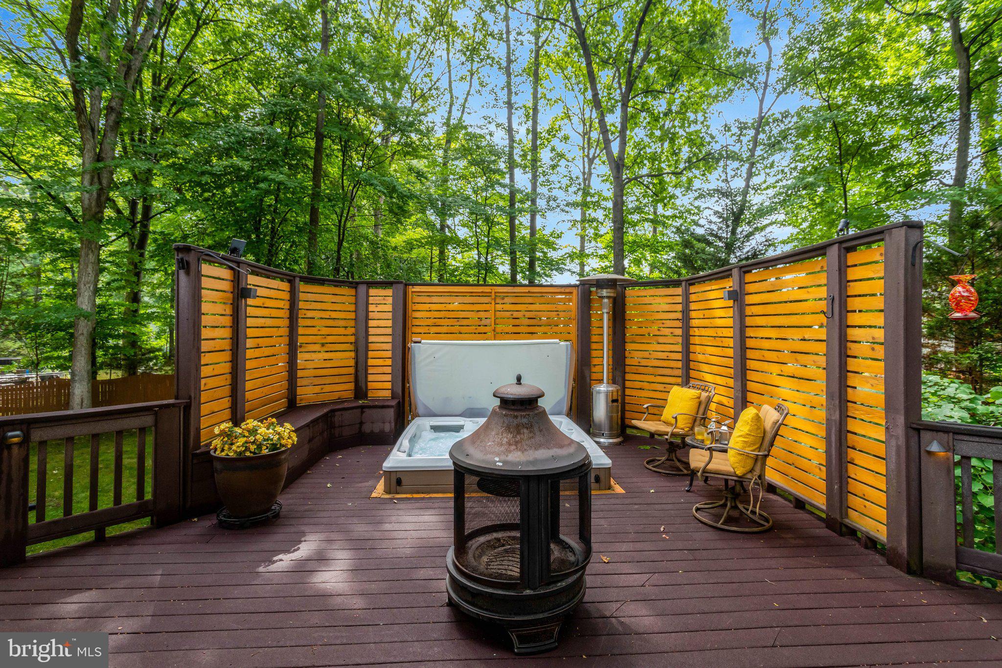 7506 Oriole Avenue Springfield, VA 22150 - Photo 53 of 67 a backyard of a house with fountain table and chairs