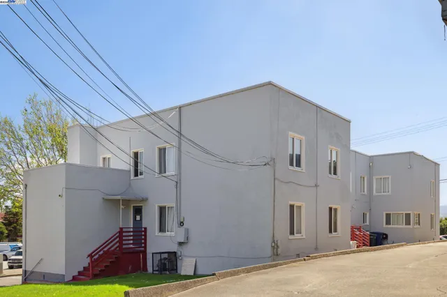 a view of a street with buildings